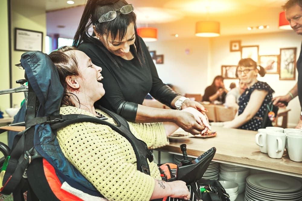 Support workers helping clients